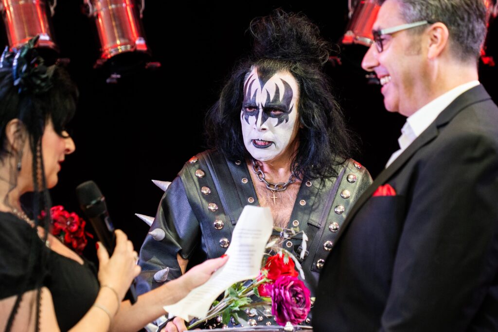 Kiss Character Minister with Wedding Bride and Groom at Rock N Roll Wedding Chapel
