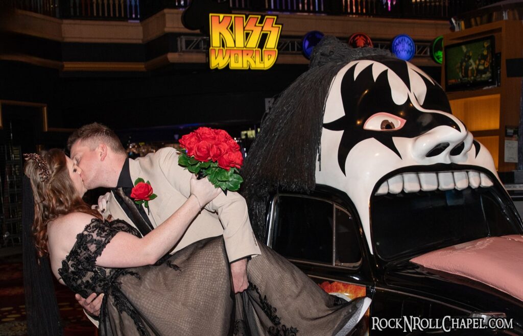 Wedding Bride and Groom Kissing At Entrance